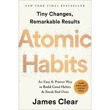 Book cover of 'Atomic Habits' by James Clear with a white background. available at MJ BoardGames Lebanon