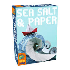 Box of Sea Salt & Paper with a sailboat design on a blue background. Sea Salt and Paper origami-themed strategy card game available at MJ BoardGames Lebanon