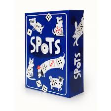 Spots board game featuring adorable dog artwork, dice, and tokens — a fun push-your-luck dice game for families and friends, available at MJ BoardGames Lebanon.