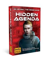 Box of 'Hidden Agenda' game with a person's face on a red background. available at MJ BoardGames Lebanon